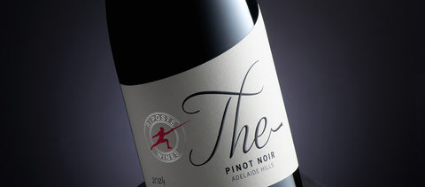 Wine bottle with 'The' Pinot Noir 2024 label